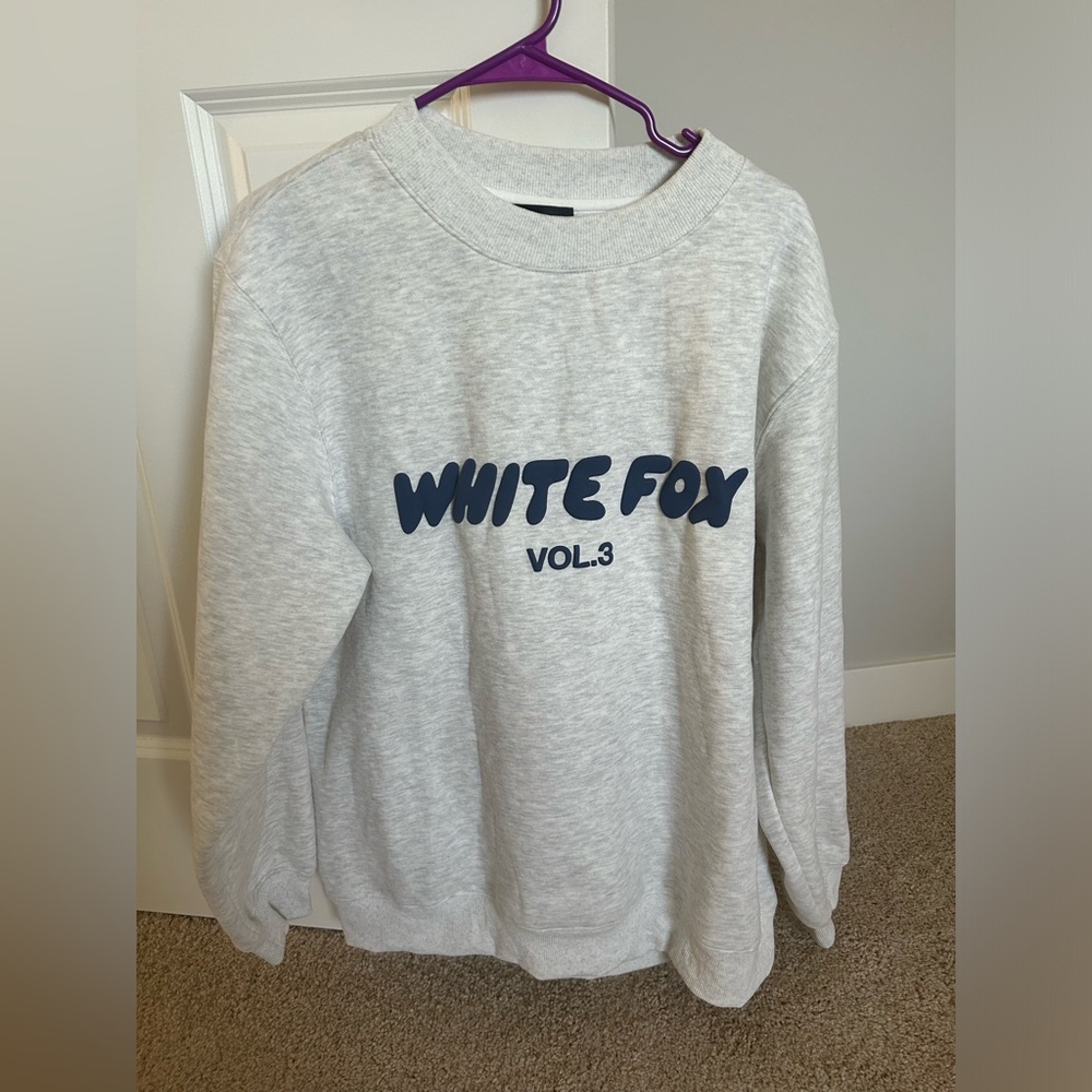 White Fox grey pullover. Size M/L. Grey with navy lettering.